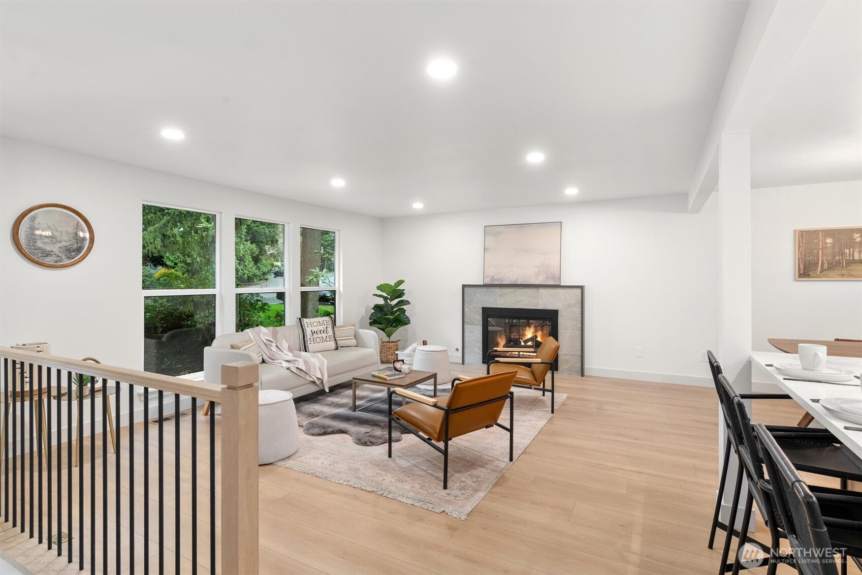22929 38th Avenue Southeast Bothell, WA 98021 - Photo 3 of 37 a living room with furniture and a fireplace