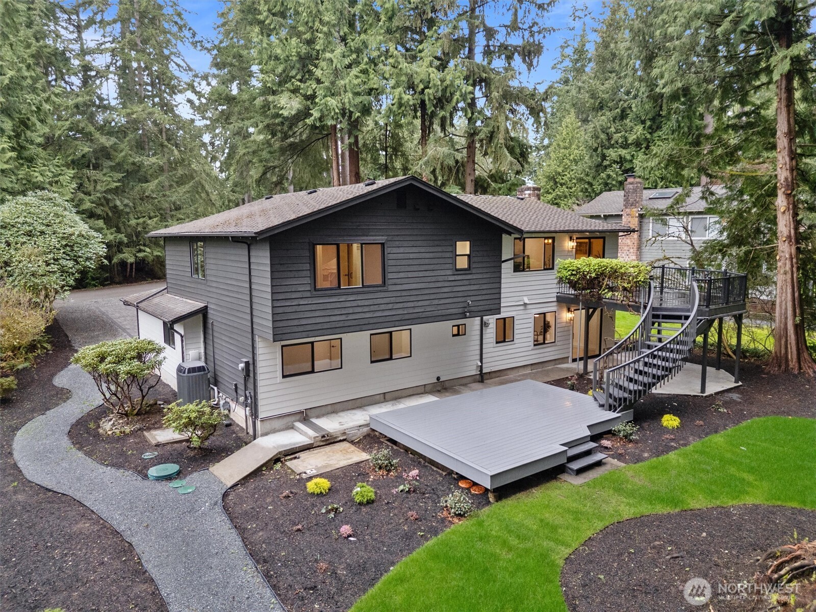22929 38th Avenue Southeast Bothell, WA 98021 - Photo 31 of 37 a backyard of a house with table and chairs