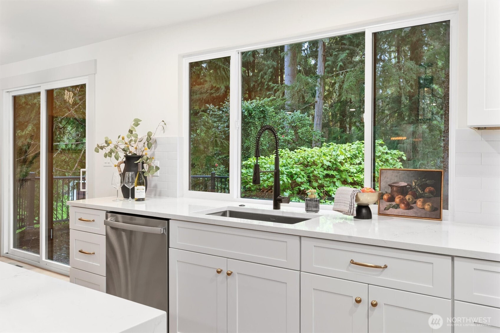 22929 38th Avenue Southeast Bothell, WA 98021 - Photo 8 of 37 a kitchen with a sink and large window