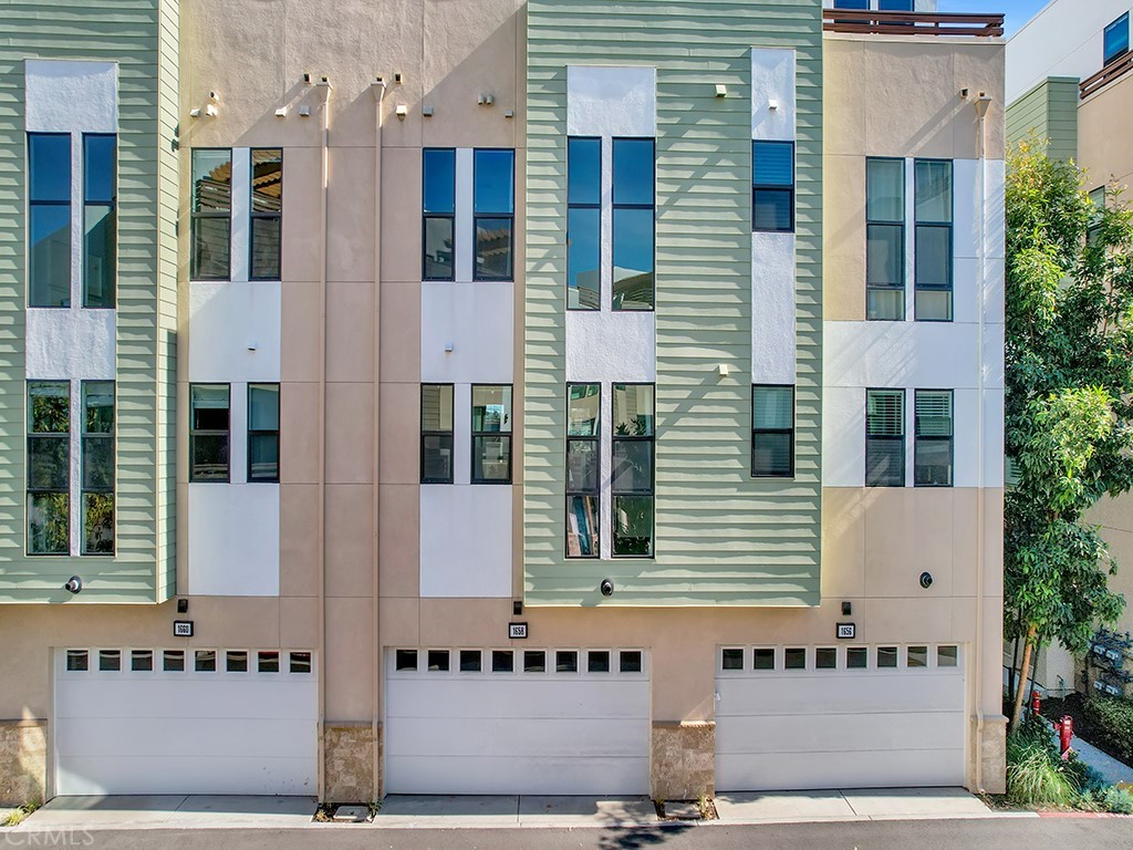 1658 Topanga Costa Mesa, CA 92627 - Photo 29 of 32 a front view of a building with a street