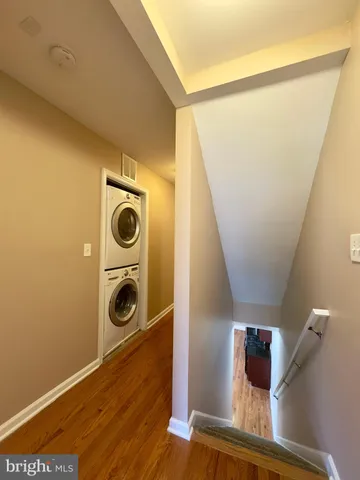 a view of a livingroom with a ceiling fan and window
