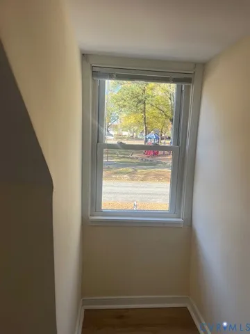 a view of a room that has a window