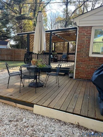 a view of outdoor sitting area with furniture