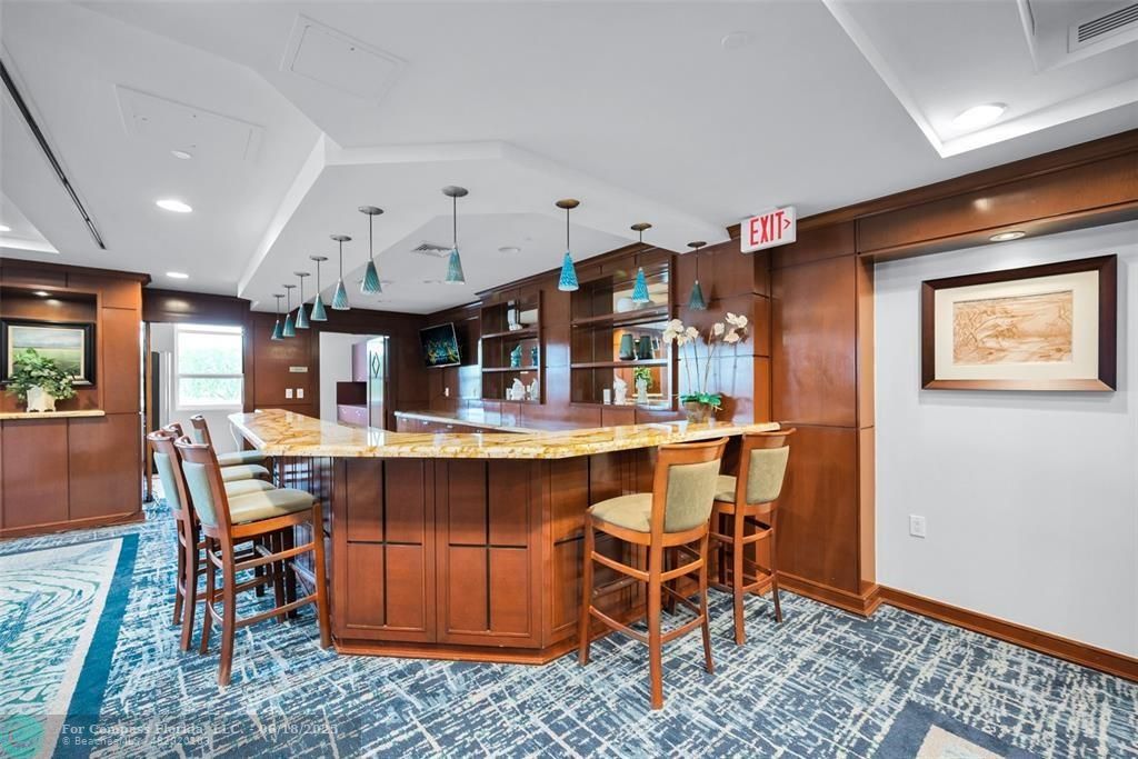 1819 Southeast 17th Street, Unit 803 Fort Lauderdale, FL 33316 - Photo 14 of 20 a view of a dining room with furniture
