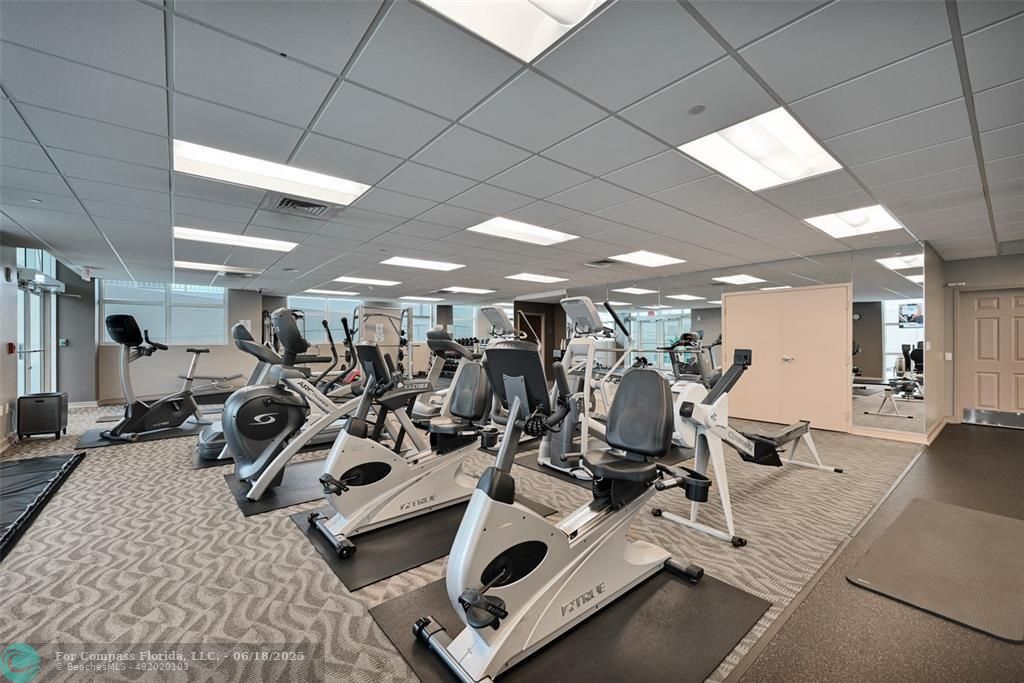 1819 Southeast 17th Street, Unit 803 Fort Lauderdale, FL 33316 - Photo 16 of 20 a view of a room with gym equipment