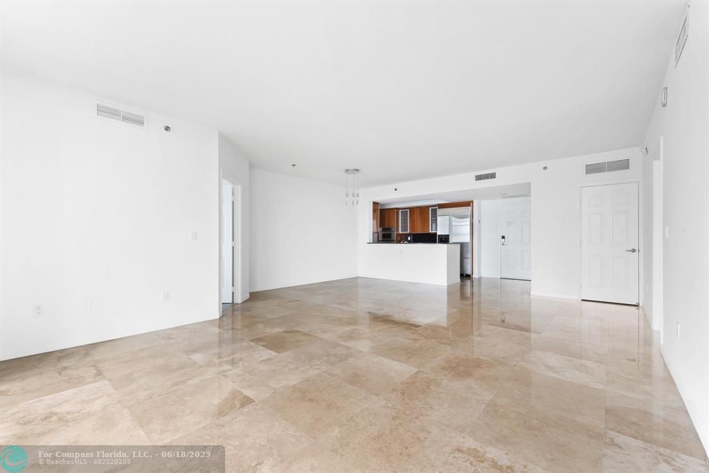 1819 Southeast 17th Street, Unit 803 Fort Lauderdale, FL 33316 - Photo 3 of 20 a view of empty room with wooden floor