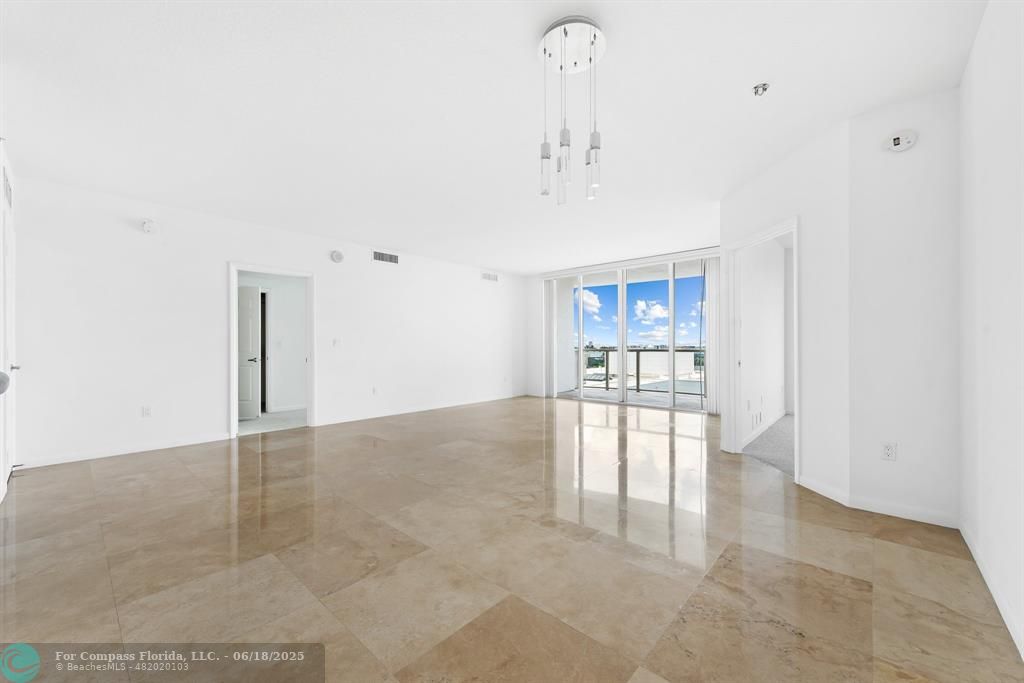 1819 Southeast 17th Street, Unit 803 Fort Lauderdale, FL 33316 - Photo 5 of 20 a view of an empty room with a window