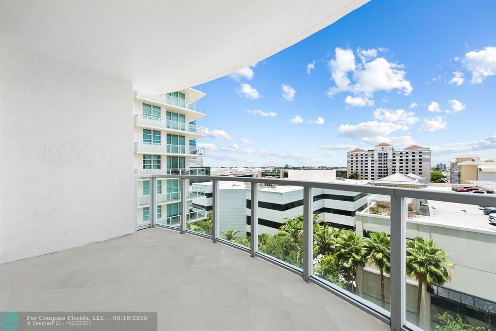 1819 Southeast 17th Street, Unit 803 Fort Lauderdale, FL 33316 - Photo 6 of 20 a view of a chairs and table in a balcony