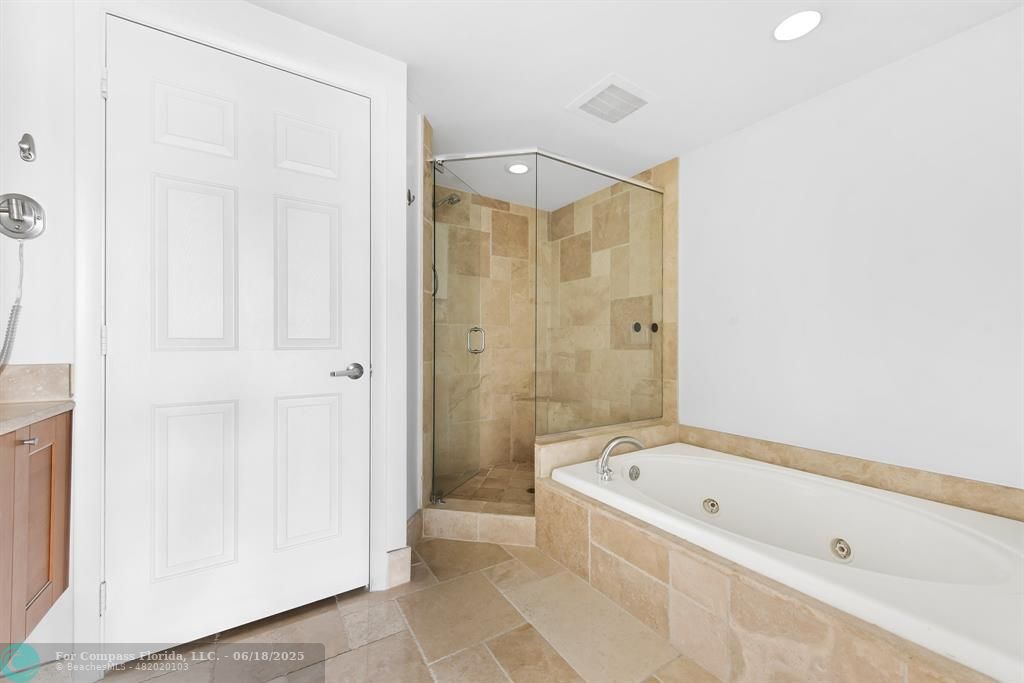 1819 Southeast 17th Street, Unit 803 Fort Lauderdale, FL 33316 - Photo 10 of 20 a bathroom with a bathtub and shower