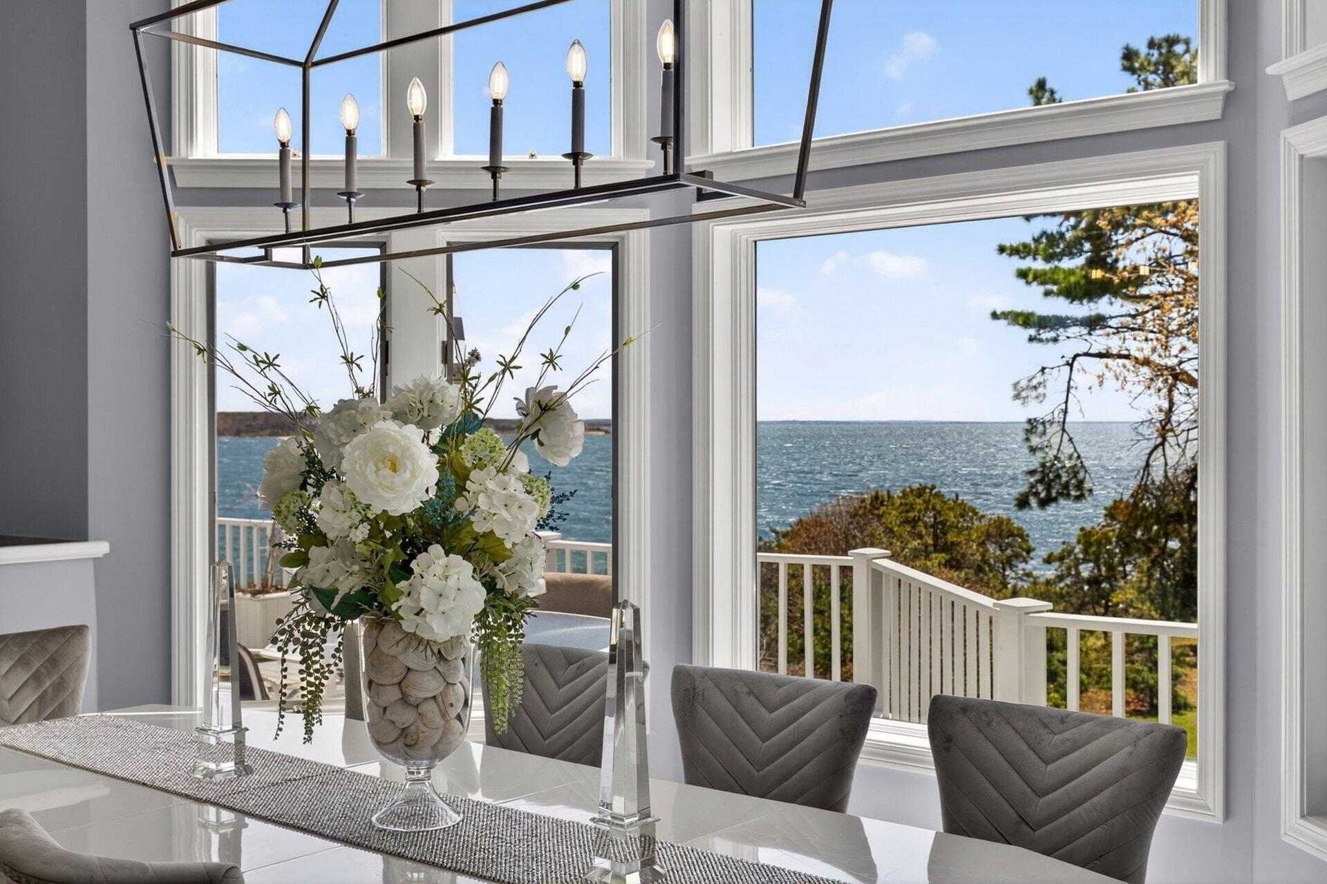 461 Wings Neck Road Pocasset, MA 02559 - Photo 15 of 42 a view of a balcony with furniture