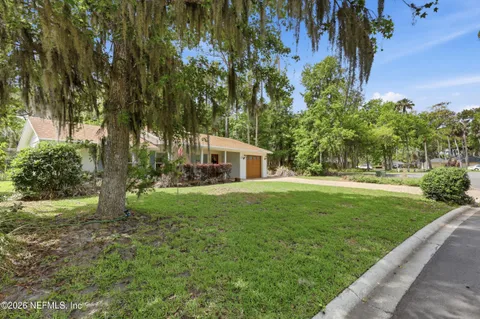 a view of a house with garden