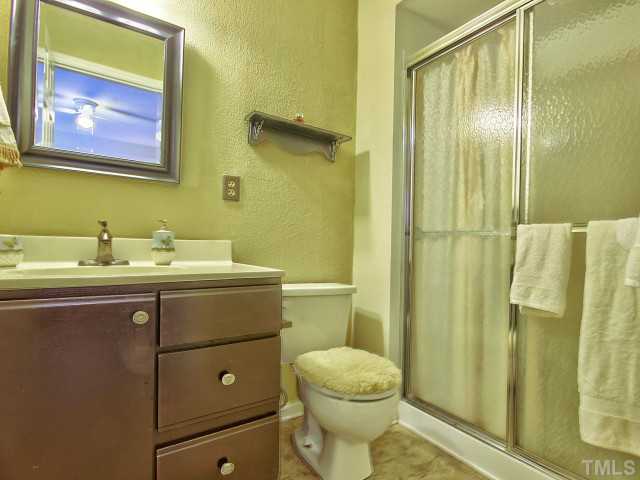 5600 Hamstead Crossing Raleigh, NC 27612 - Photo 16 of 25 This master bath gives friends and family all the privacy that they need.