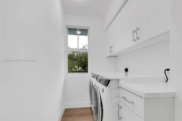 a view of utility room with washer and dryer