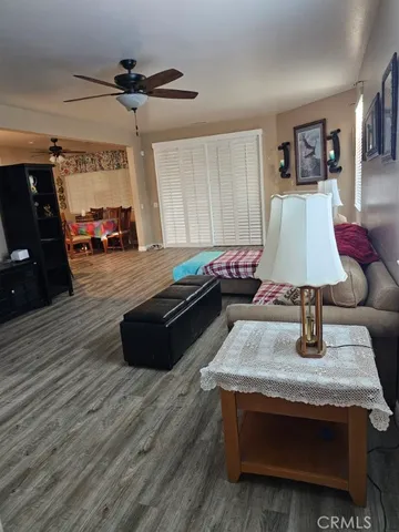 a bed room with furniture and a window