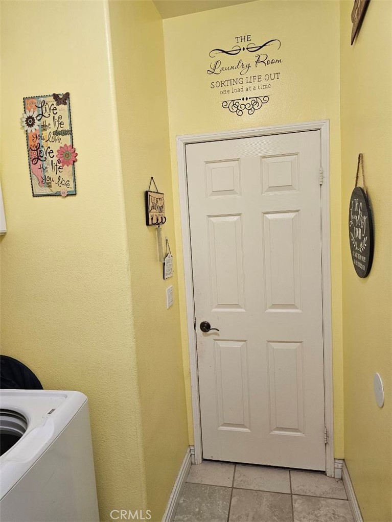 11847 Branch Court Adelanto, CA 92301 - Photo 6 of 18 a bathroom with a shower and a sink