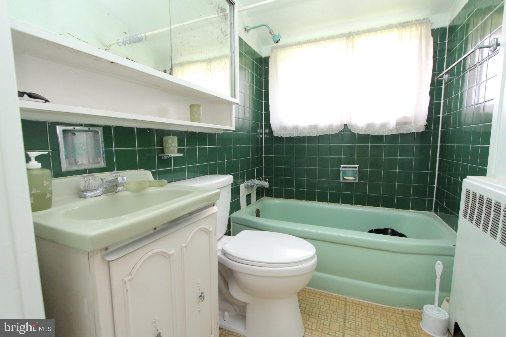 41 Jewel Lane Levittown, PA 19055 - Photo 9 of 24 a bathroom with a sink toilet and shower