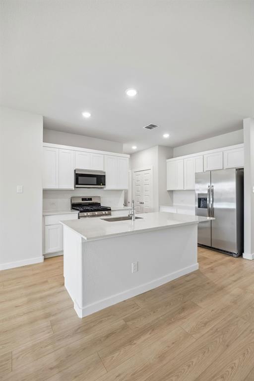 332 Millwood Road Lavon, TX 75166 - Photo 9 of 32 Kitchen in the Mesquite home plan by Trophy Signature Homes – REPRESENTATIVE PHOTO