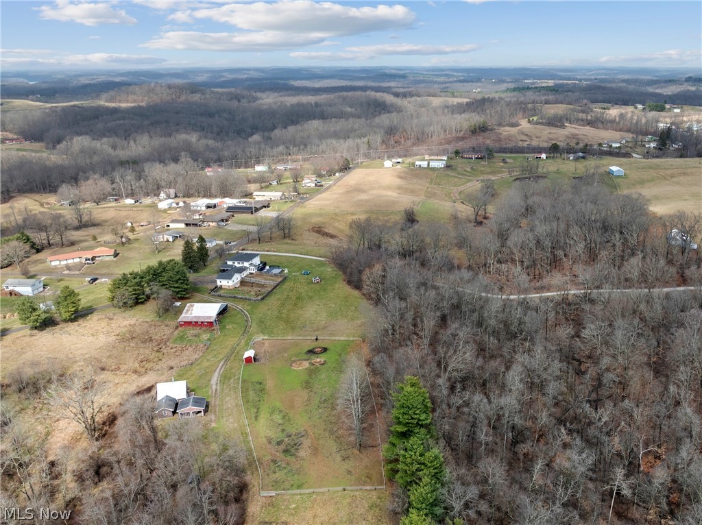 64508 Slade Road Cambridge, OH 43725 - Photo 46 of 50 Aerial view of sparsely populated area with a forest