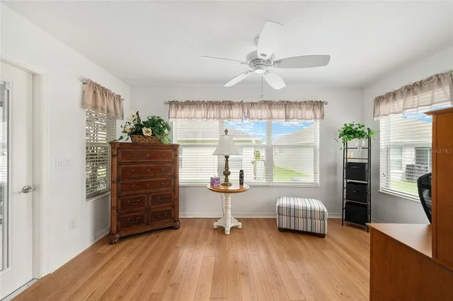 a bedroom with furniture and a window
