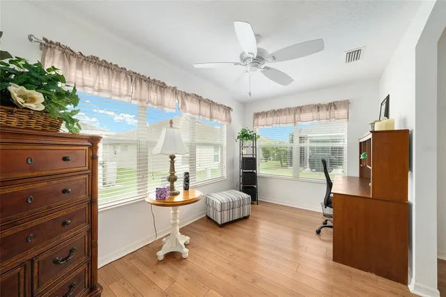 a living room with furniture and decor