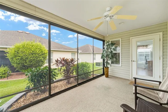 a view of a hallway with white walls