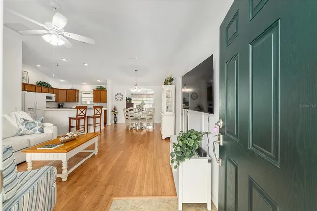 a view of a living room and dining room