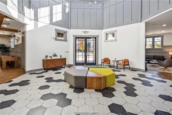 a workspace with furniture and a garden