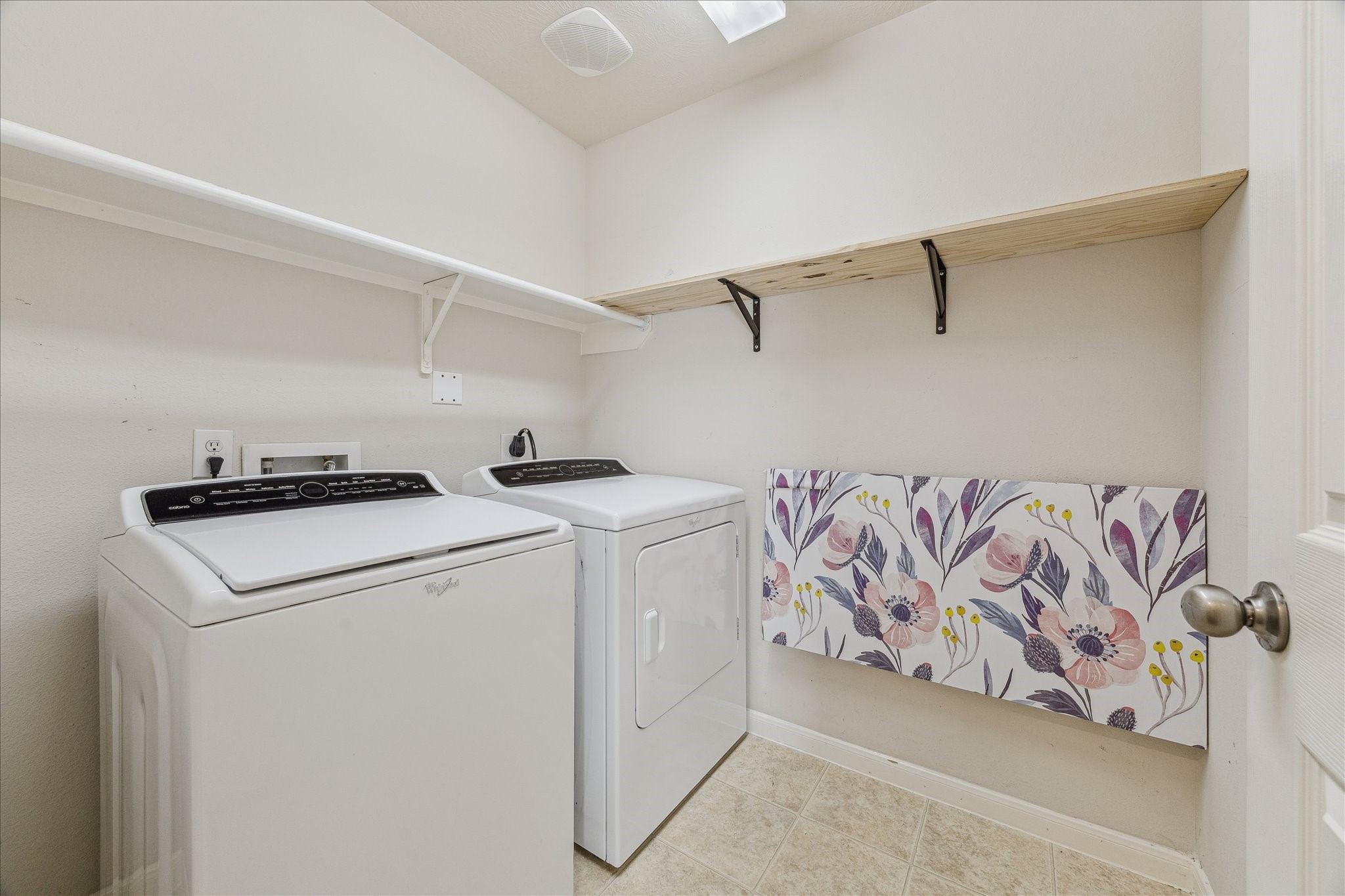 15203 Knotty Chestnut Street Cypress, TX 77429 - Photo 25 of 32 The indoor laundry is convenient to all three bedrooms and near the garage access. The laundry has gas and electric dryer connections. (Existing washer and dryer are available for purchase).