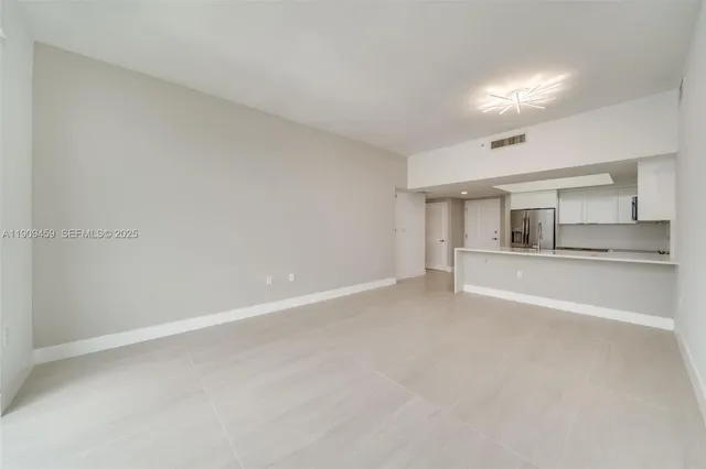 a view of an empty room with window