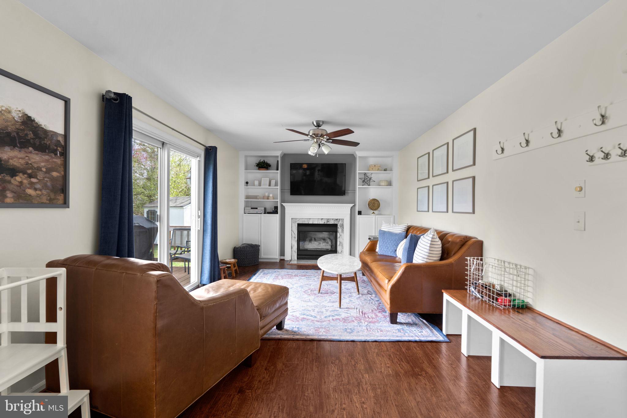 20747 Laplume Place Ashburn, VA 20147 - Photo 16 of 48 Gas fireplace with new, custom built-ins