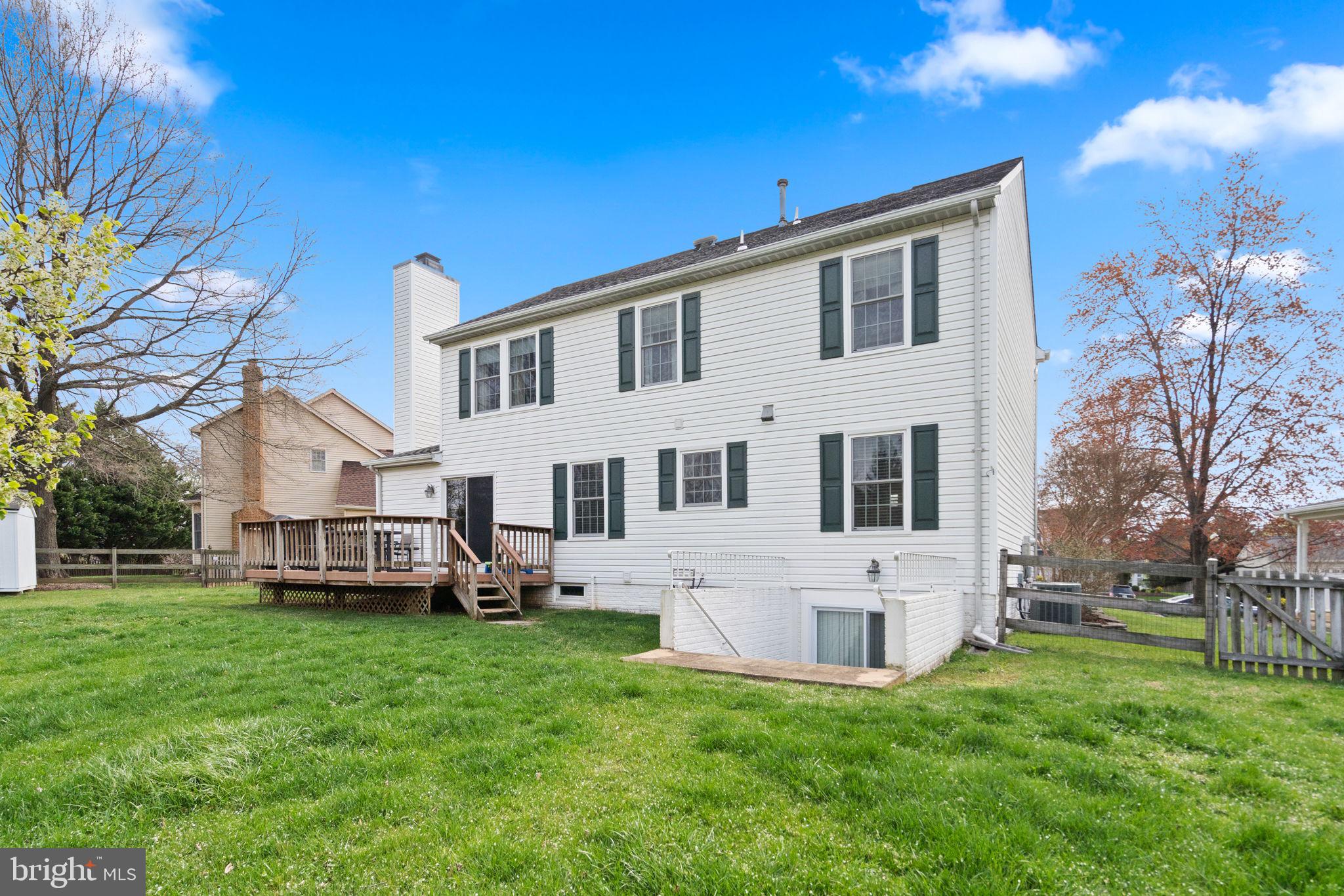 20747 Laplume Place Ashburn, VA 20147 - Photo 43 of 48 View of home from yard
