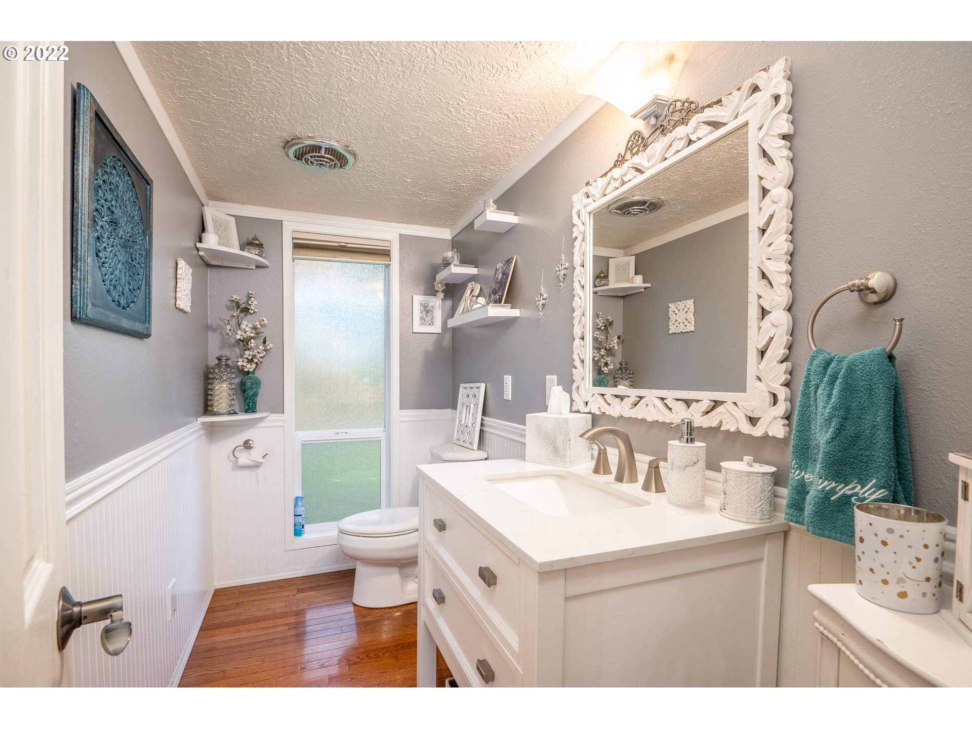 39845 Deerhorn Road Springfield, OR 97478 - Photo 19 of 29 a bathroom with a sink a toilet a mirror and shower