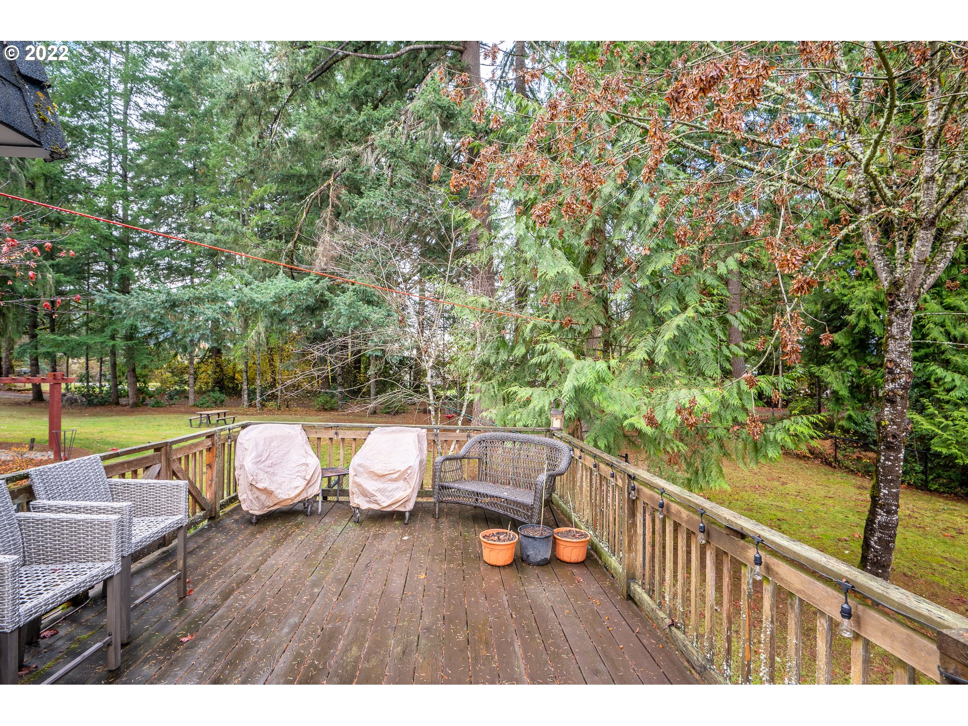 39845 Deerhorn Road Springfield, OR 97478 - Photo 24 of 29 a balcony with wooden floor