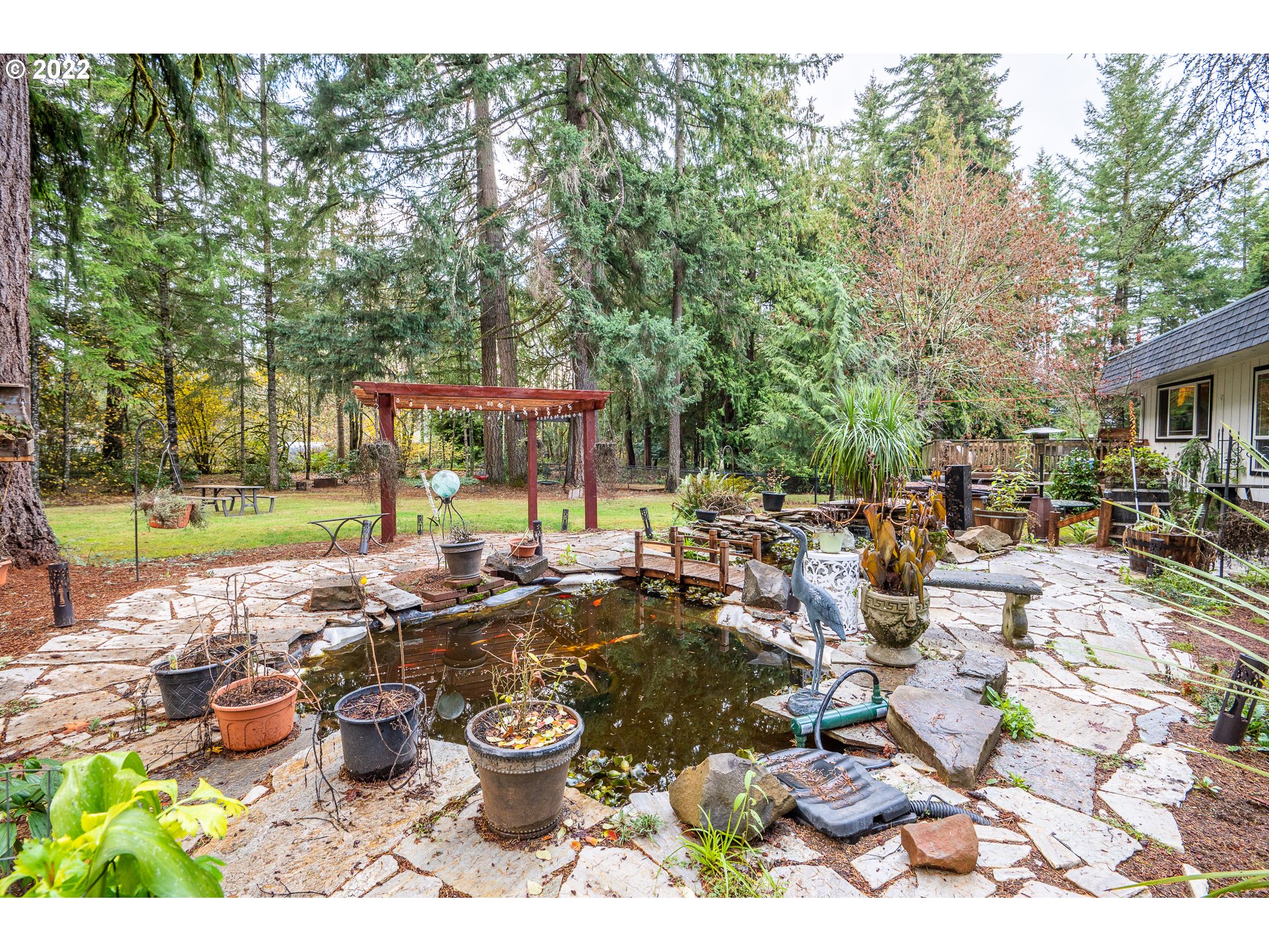 39845 Deerhorn Road Springfield, OR 97478 - Photo 26 of 29 a view of swimming pool with lawn chairs and plants