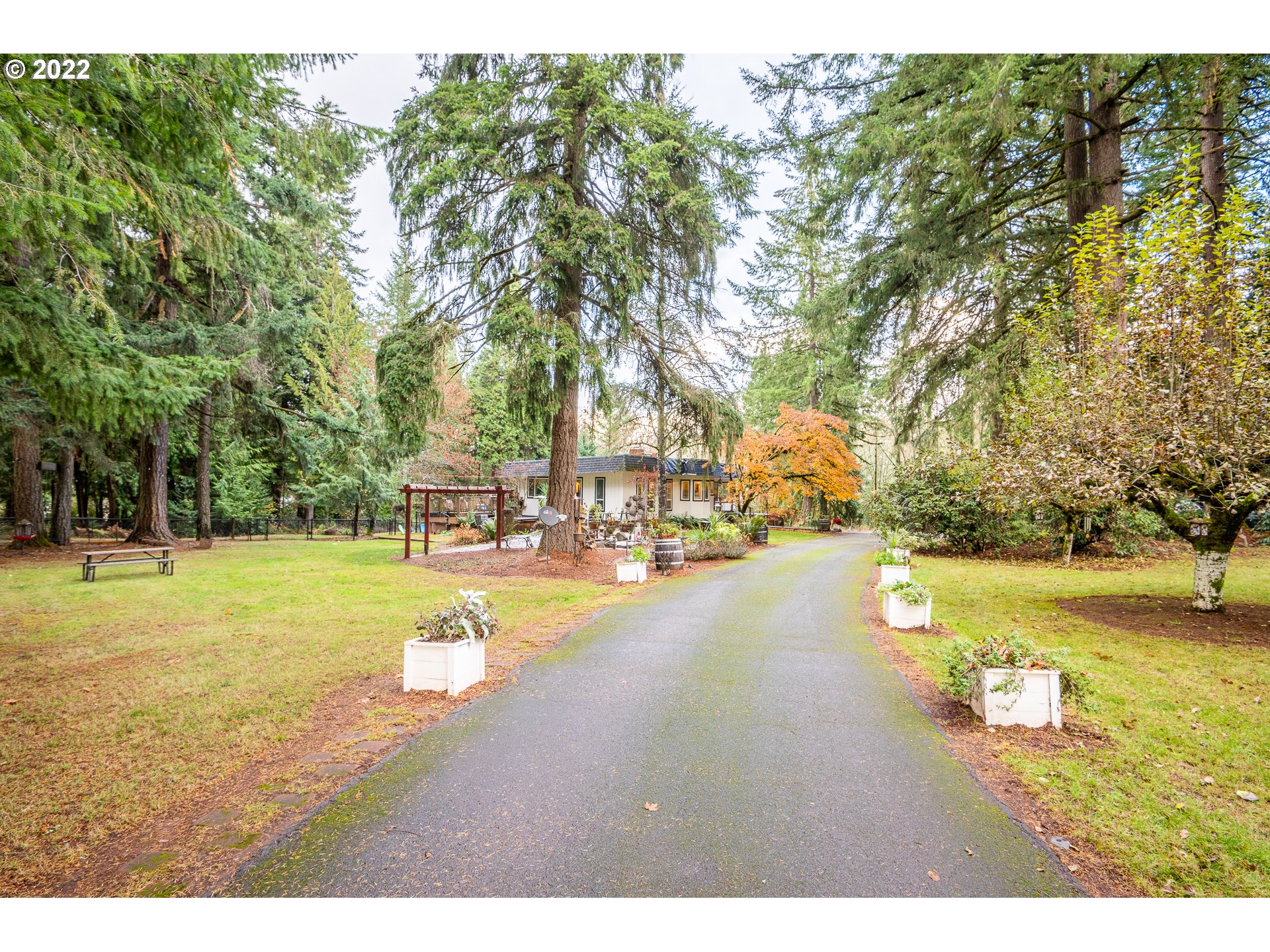 39845 Deerhorn Road Springfield, OR 97478 - Photo 27 of 29 a view of a swimming pool with an outdoor space and seating area
