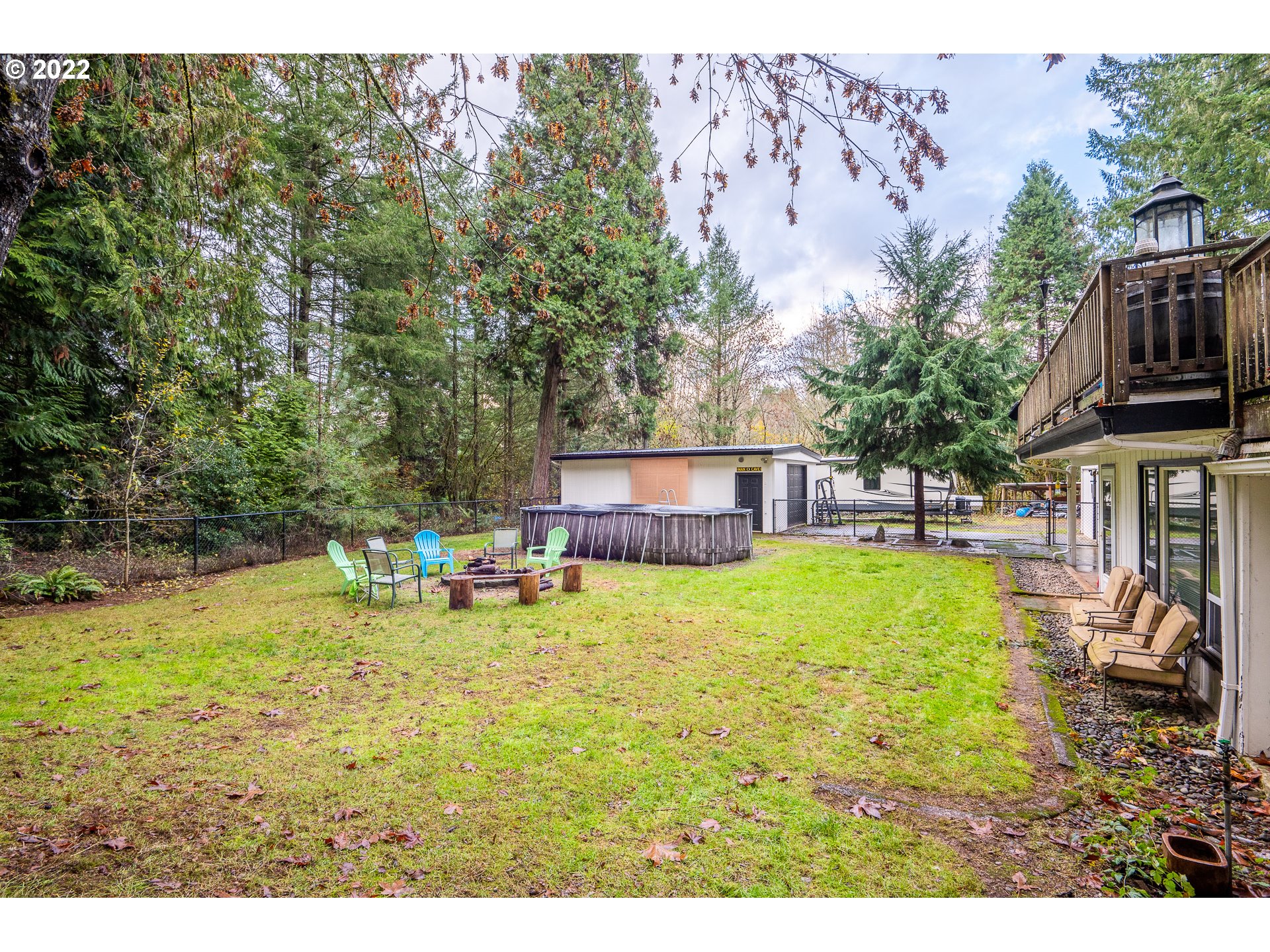 39845 Deerhorn Road Springfield, OR 97478 - Photo 28 of 29 a view of a swimming pool with a patio and a yard