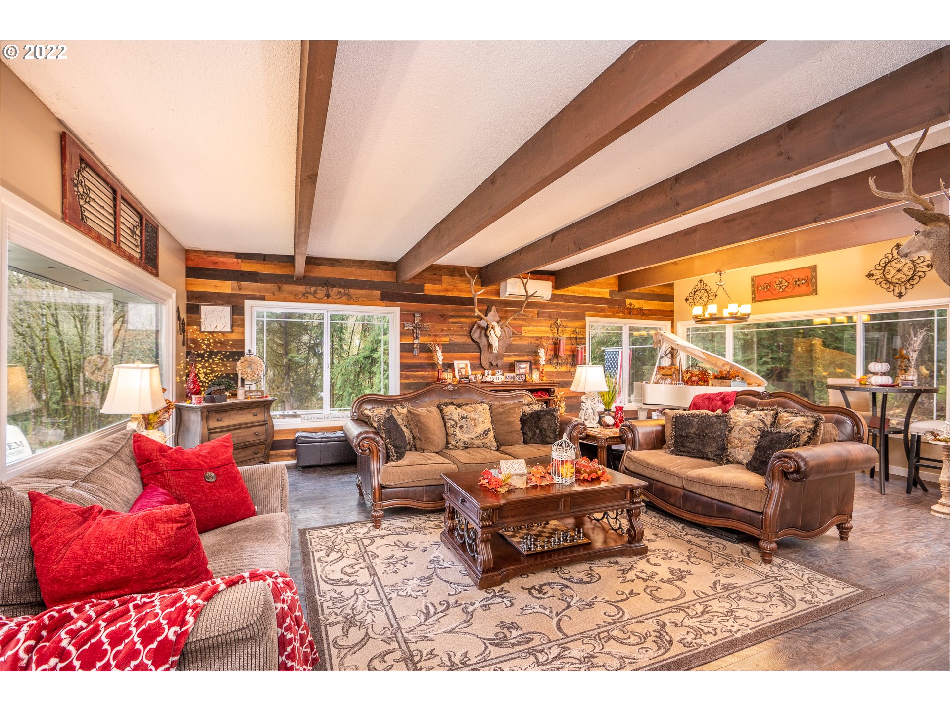 39845 Deerhorn Road Springfield, OR 97478 - Photo 6 of 29 a living room with furniture and a large window
