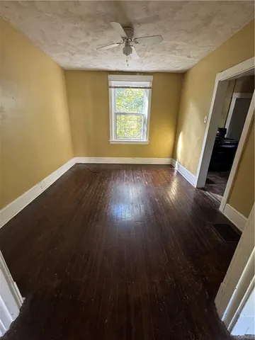 a kitchen with a sink and a refrigerator