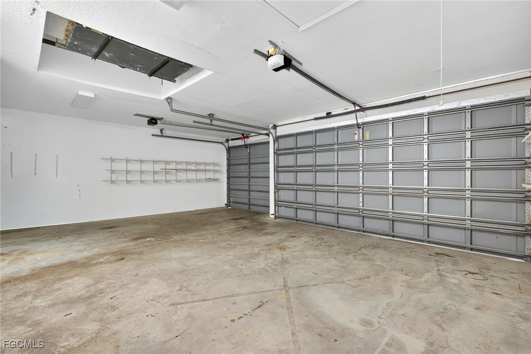2007 Southwest 43rd Terrace Cape Coral, FL 33914 - Photo 20 of 22 a view of an empty garage