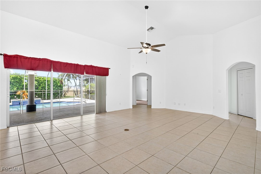 2007 Southwest 43rd Terrace Cape Coral, FL 33914 - Photo 3 of 22 a view of livingroom with furniture wooden floor and fan