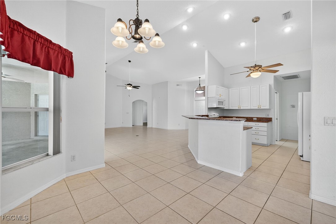 2007 Southwest 43rd Terrace Cape Coral, FL 33914 - Photo 8 of 22 a view of a kitchen with a sink and cabinets