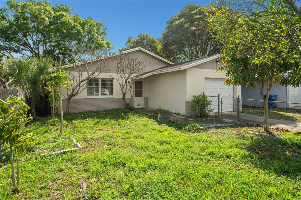 front view of a house with a yard