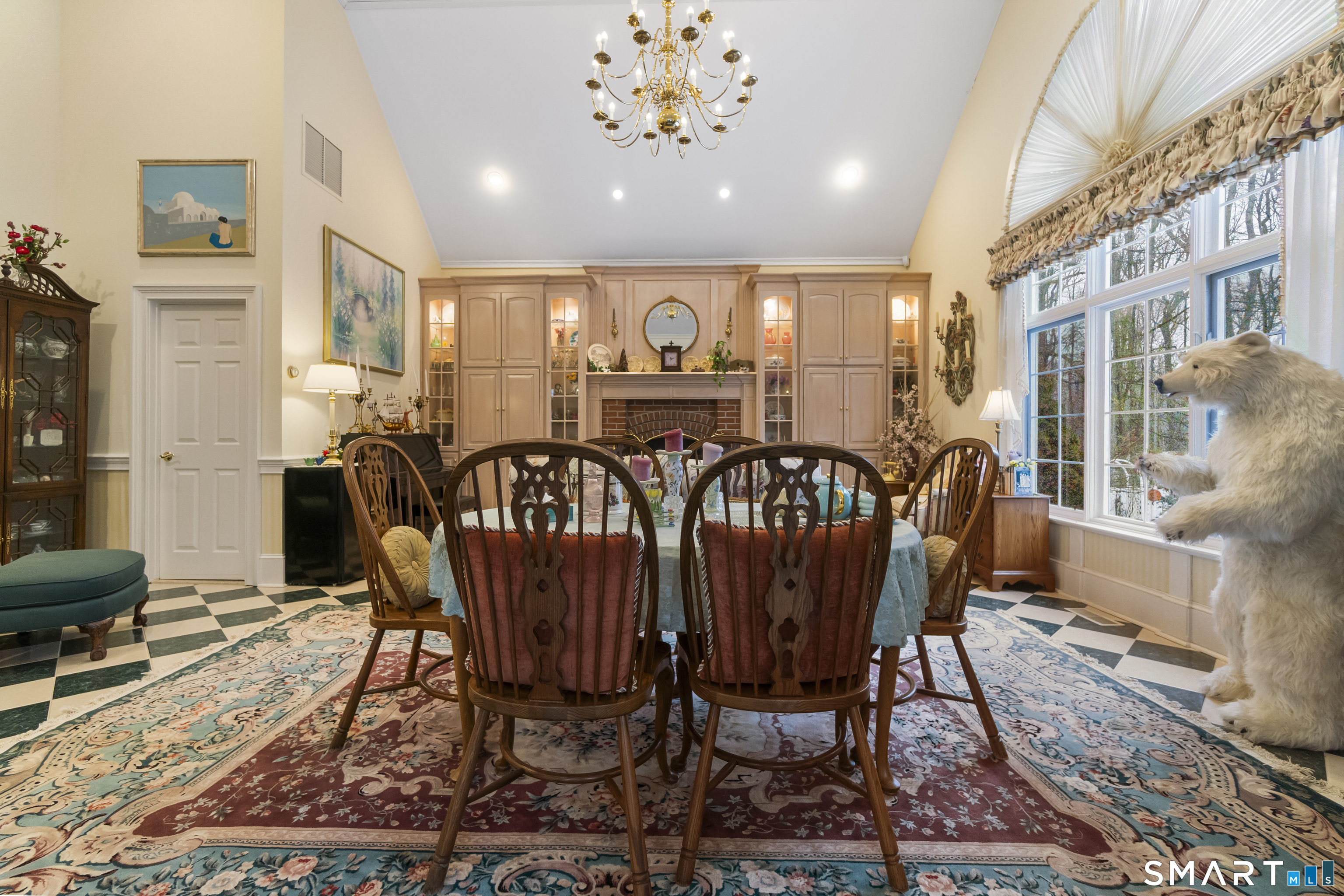 9 Perkins Road Woodbridge, CT 06525 - Photo 20 of 39 a view of a a dining room with furniture window and wooden floor