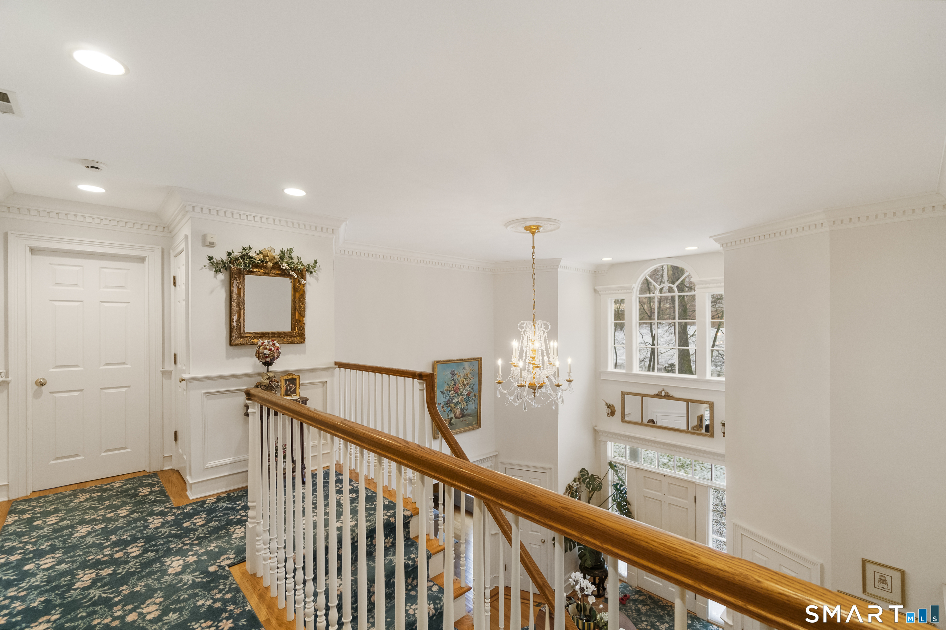 9 Perkins Road Woodbridge, CT 06525 - Photo 24 of 39 a view of a hallway with windows