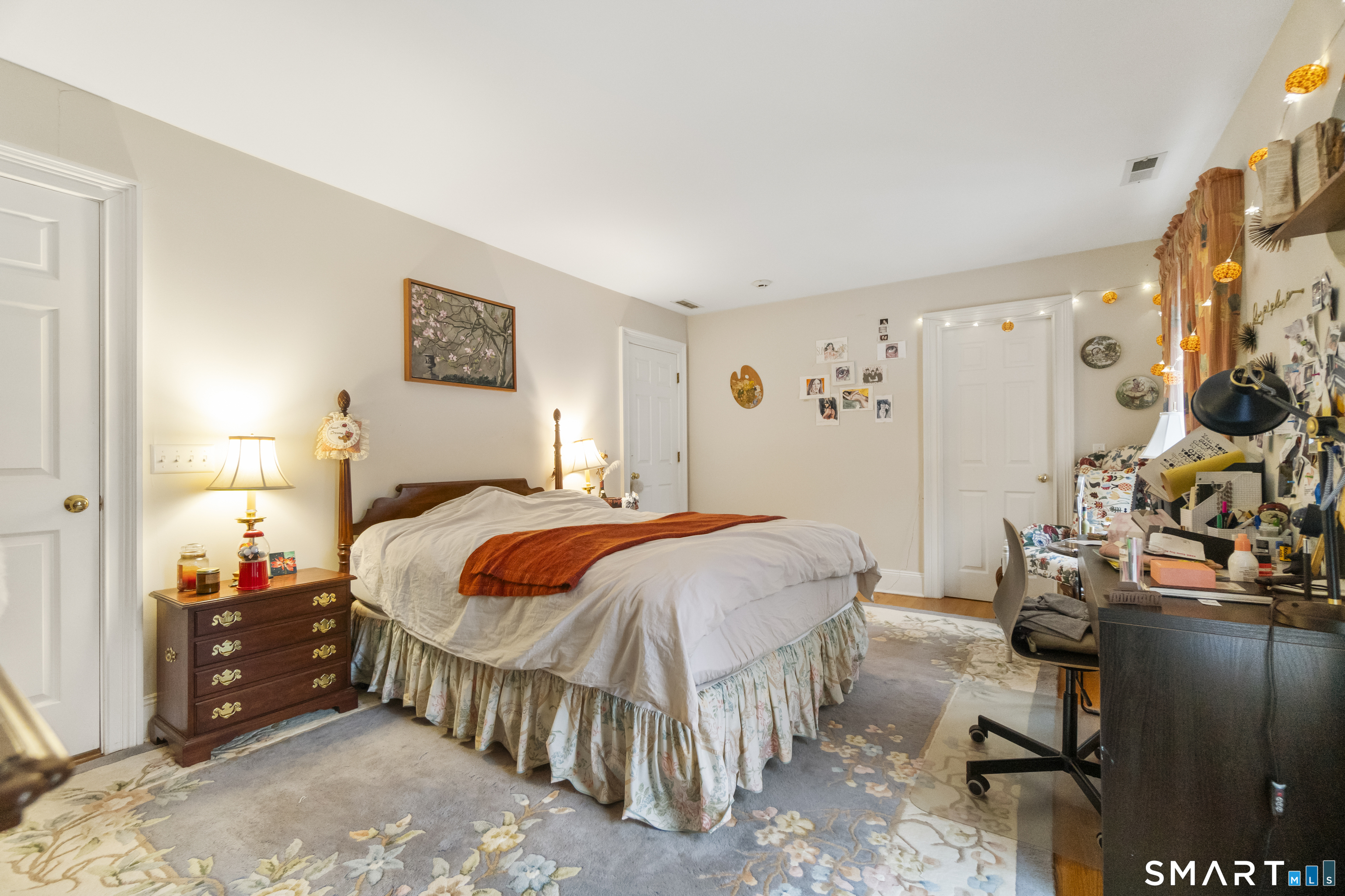 9 Perkins Road Woodbridge, CT 06525 - Photo 34 of 39 a bedroom with a bed and a mirror