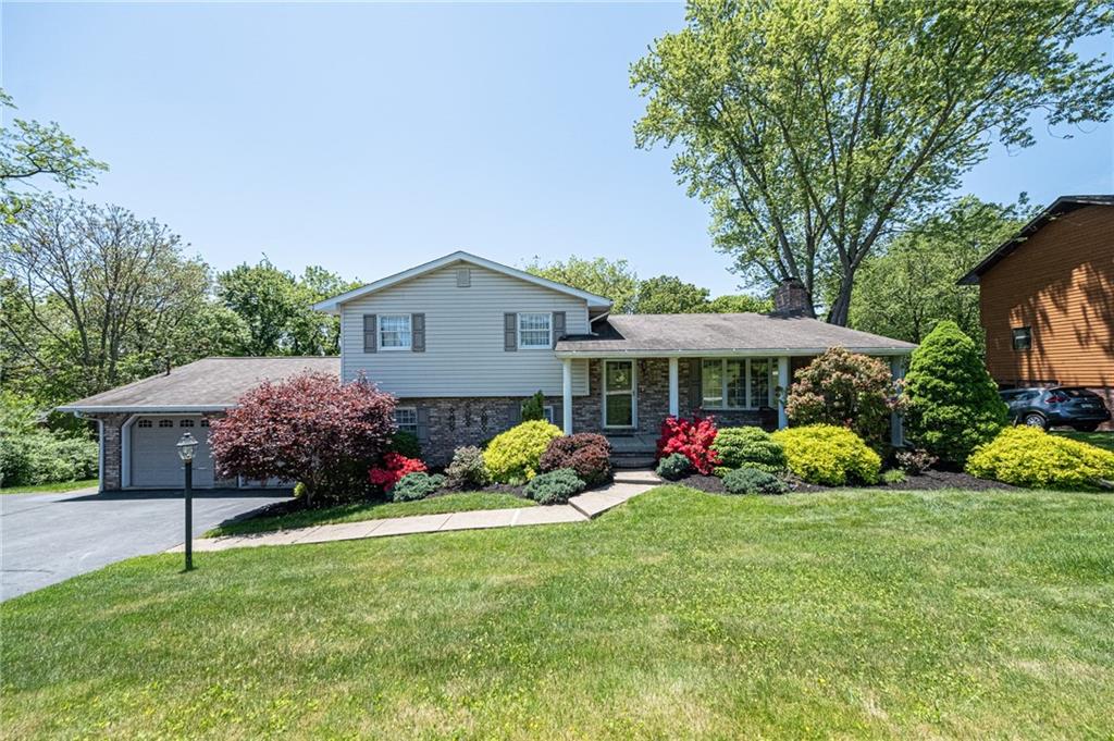 1824 Hassam Road Coraopolis, PA 15108 - Photo 1 of 24 LARGER THAN IT LOOKS, THIS MULTI LEVEL HOME FEATURES 4 BEDROOMS. 3 FULL BATHS PLUS 1/2 BATH.