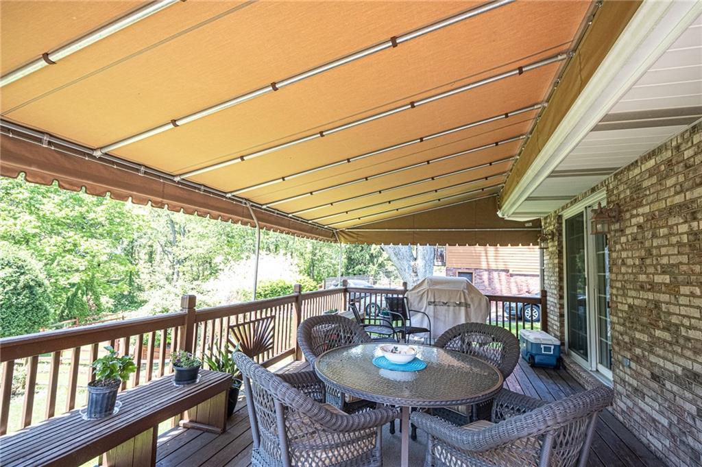 1824 Hassam Road Coraopolis, PA 15108 - Photo 2 of 24 SPACIOUS AWNING COVERED REAR DECK.