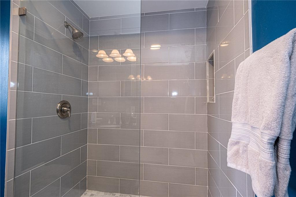 1824 Hassam Road Coraopolis, PA 15108 - Photo 15 of 24 BEAUTIFUL GLASS ENCLOSED SHOWER IN LOWER LEVEL MASTER BEDROOM.
