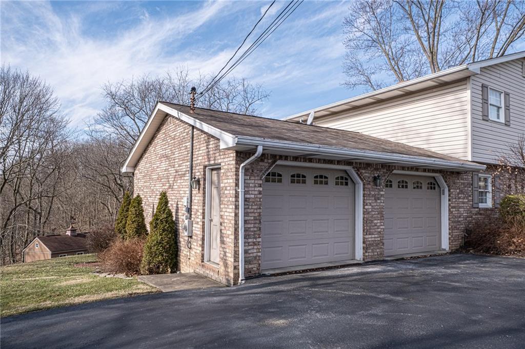 1824 Hassam Road Coraopolis, PA 15108 - Photo 23 of 24 2 CAR ATTACHED GARAGE WITH MAN DOOR.