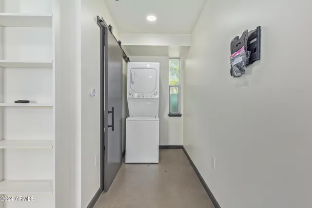 a bathroom with a shower and a sink